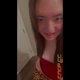 Emi stands over the toilet in a red top on her period, twerking her bare ass as she squirts diarrhea into the bowl, then shows the bowl and smiles into the camera. Vertical format video. Over 12 minutes.